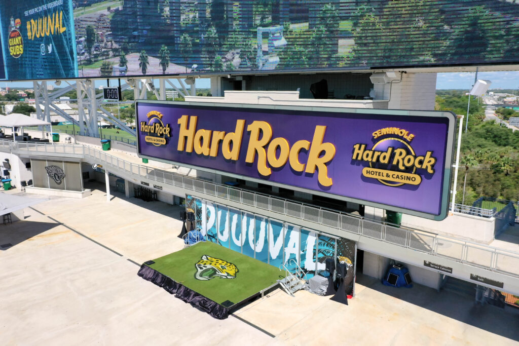 Hard Rock sign below scoreboard